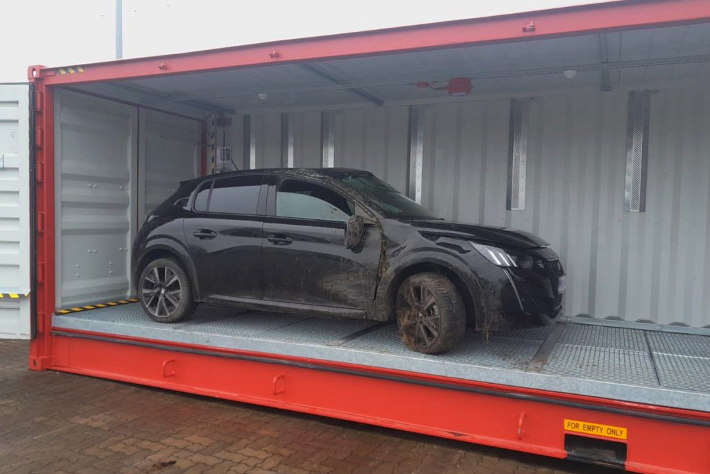 Hochvoltcontainer mit Elektroauto